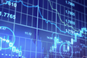 stocks on a blue screen with numbers and graphs