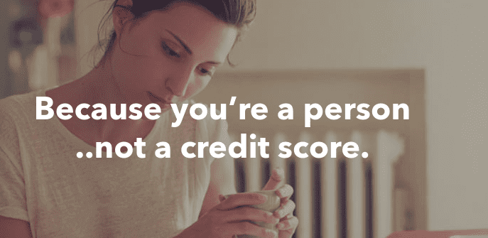 Woman facedown holding a cup termed because you are a person not a credit score