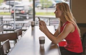 Woman using mobile app to descibe new digital banking options