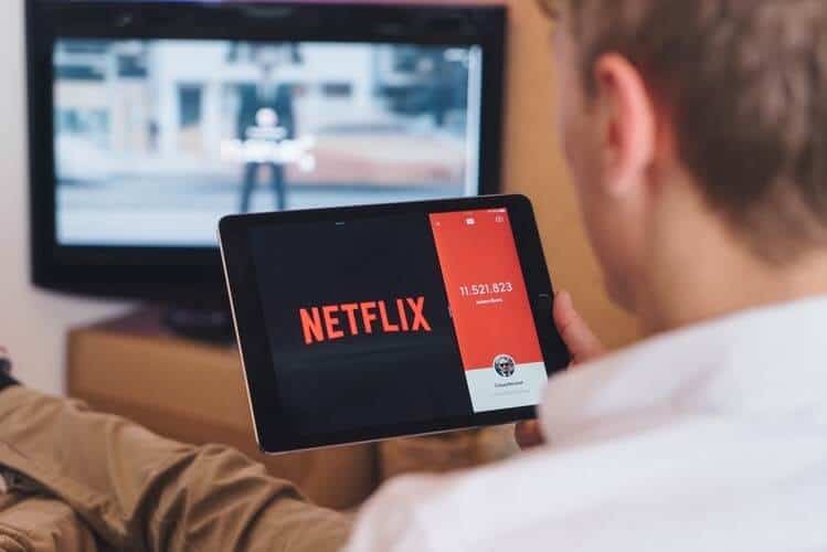 Image of man watching netflix